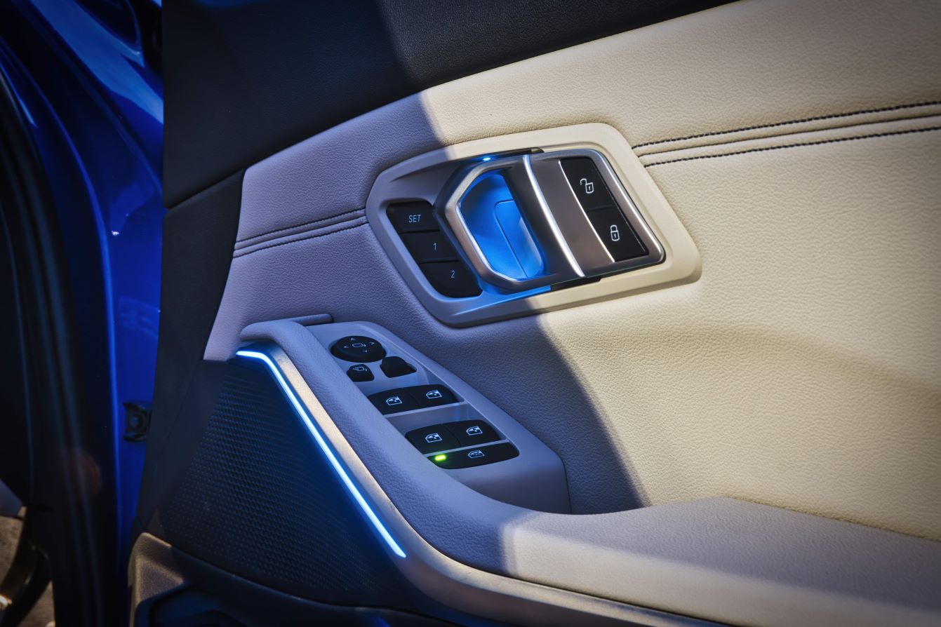 Image of a BMW door with cream leather interior